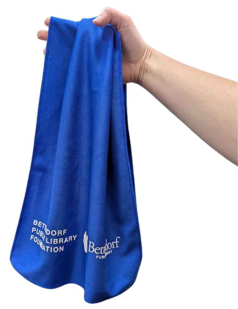 A hand holding a blue cooling towel